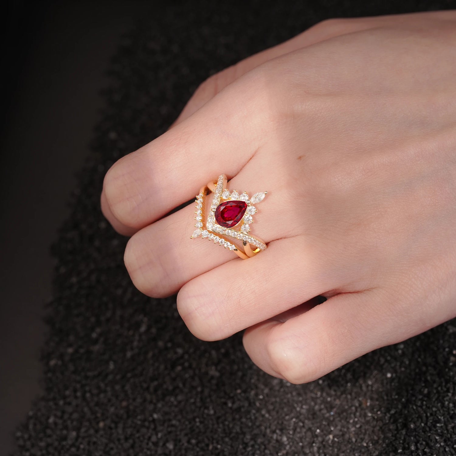 Tiara Pear Cut Ruby Bridal Ring Set with Chevron Enhancer Band