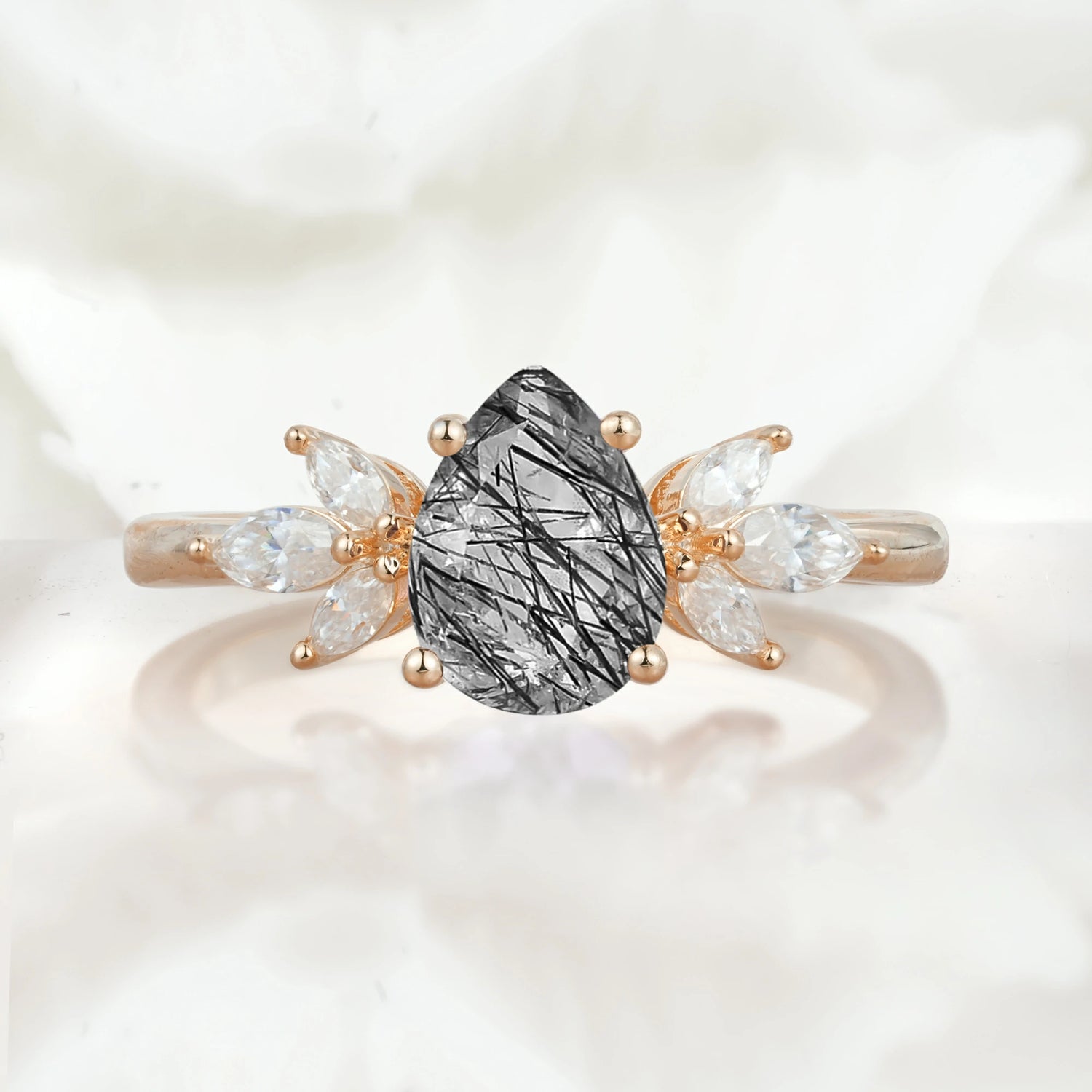 Elegant Pear-Shaped Black Rutilated Quartz Engagement Ring with Floral Side Stones