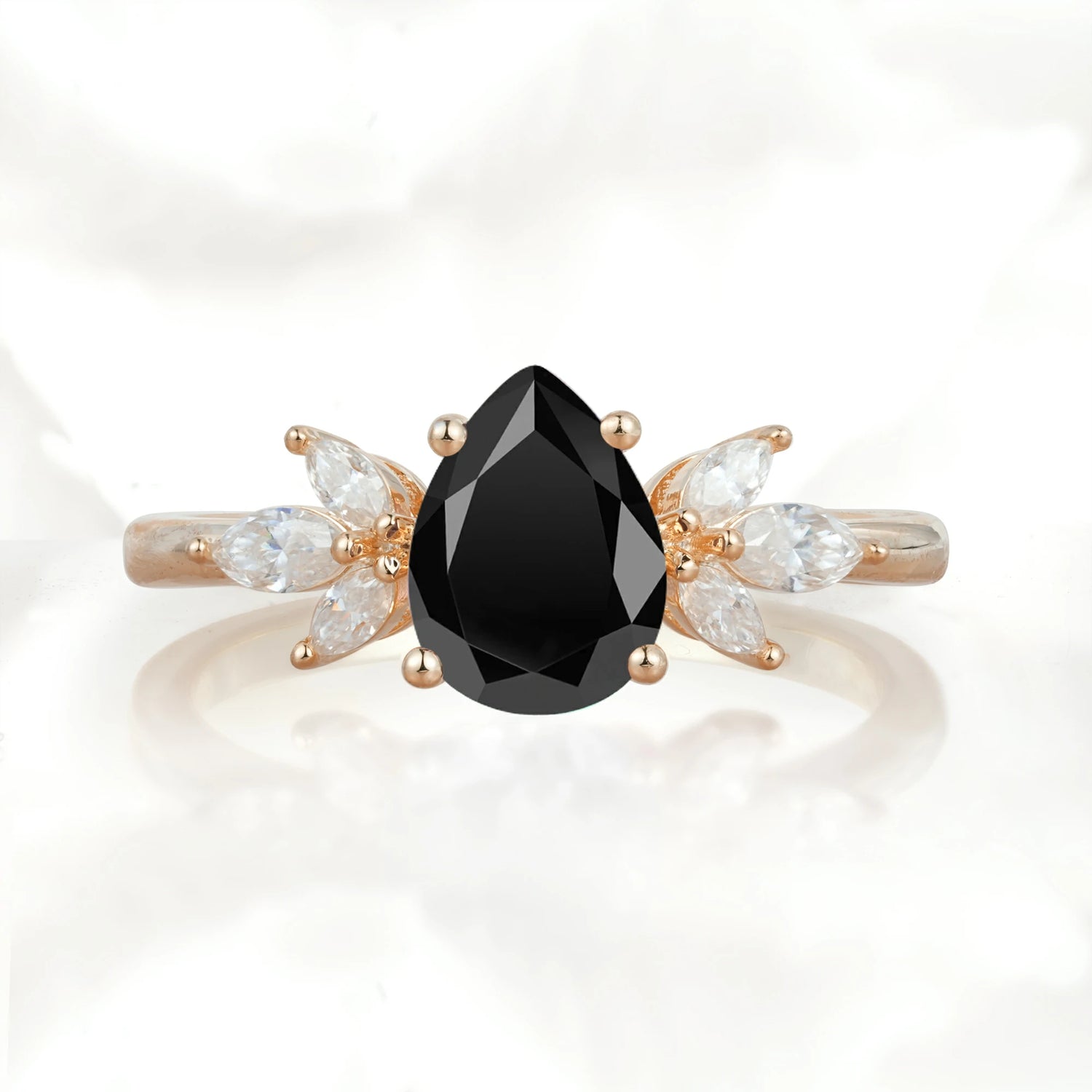 Elegant Pear-Shaped Black Onyx Engagement Ring with Floral Side Stones