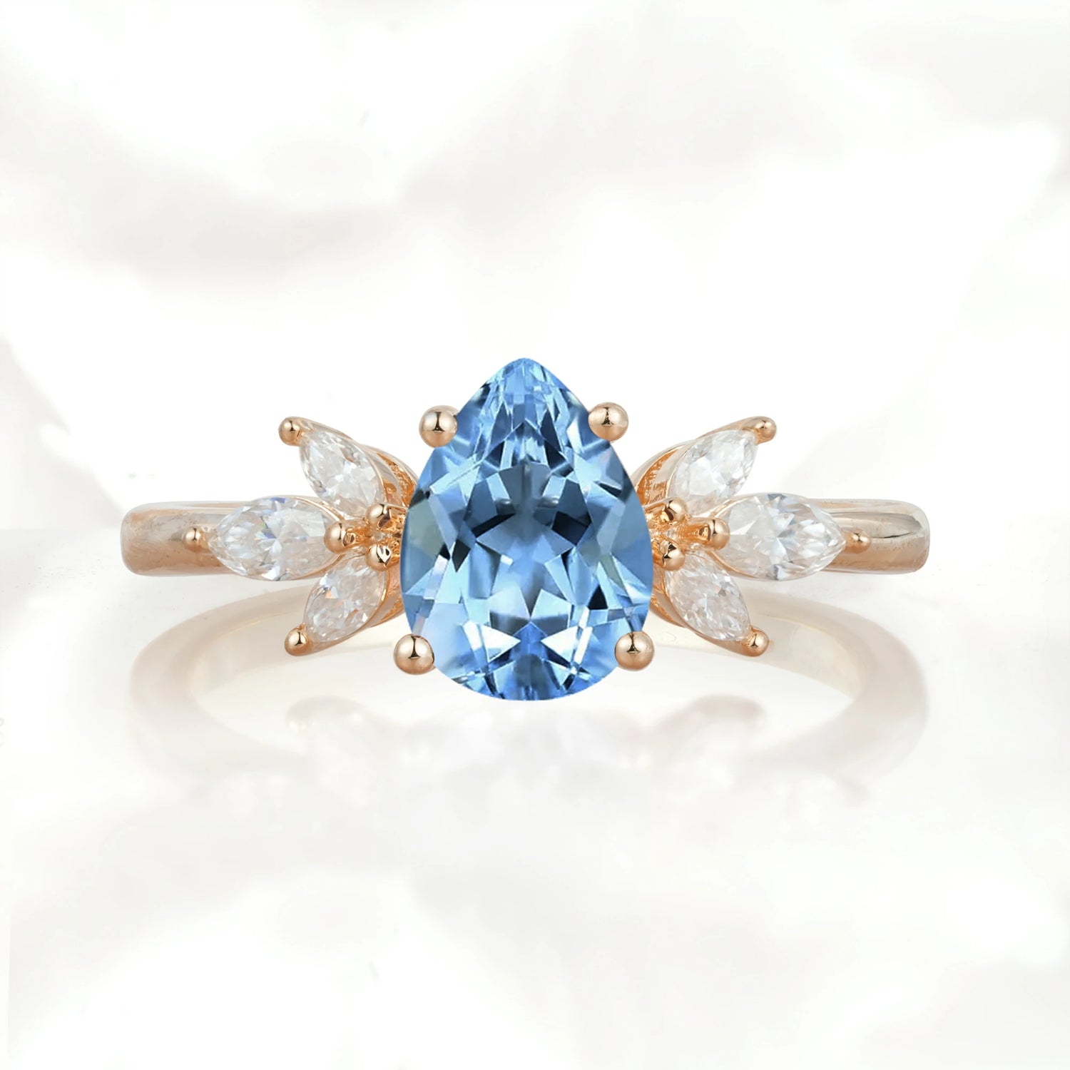 Elegant Pear-Shaped Aquamarine Engagement Ring with Floral Side Stones