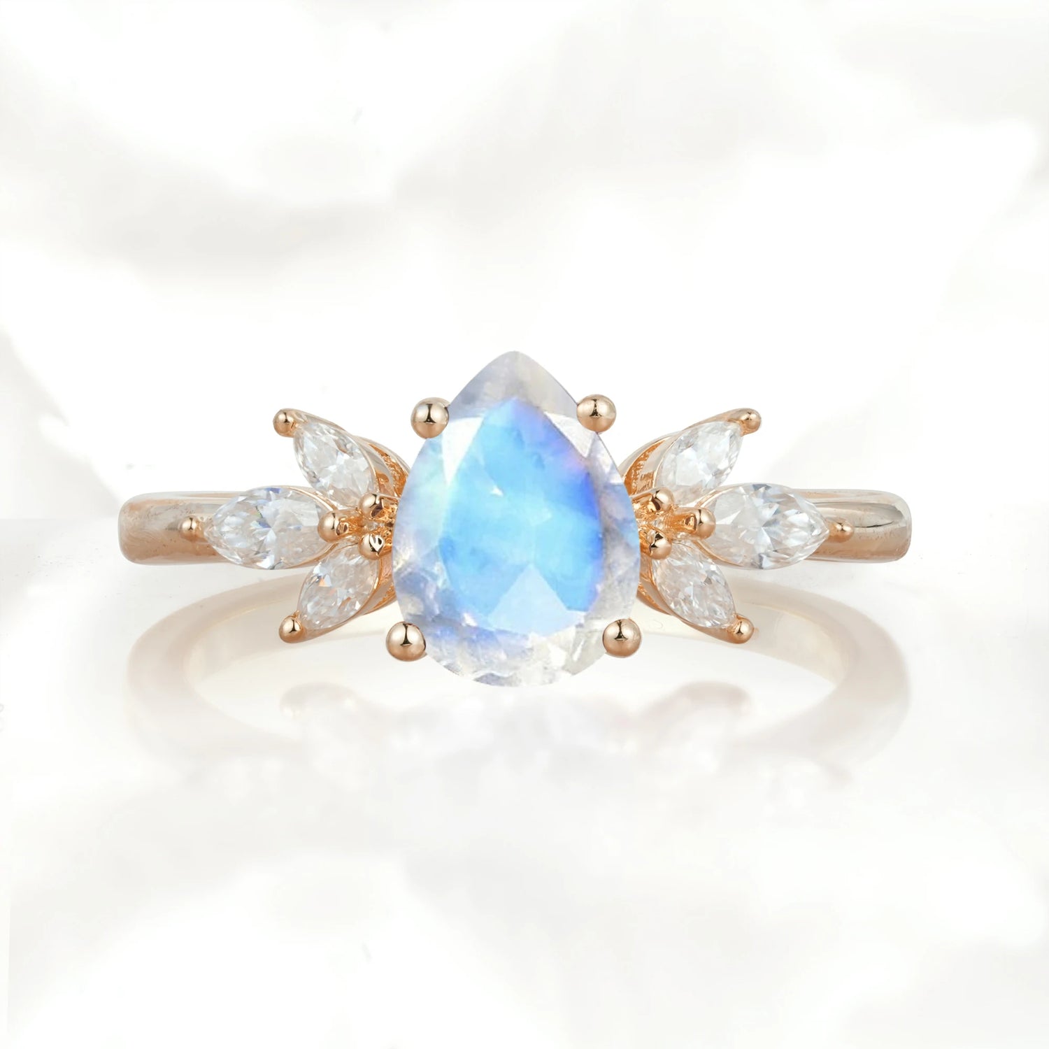 Elegant Pear-Shaped Moonstone Engagement Ring with Floral Side Stones