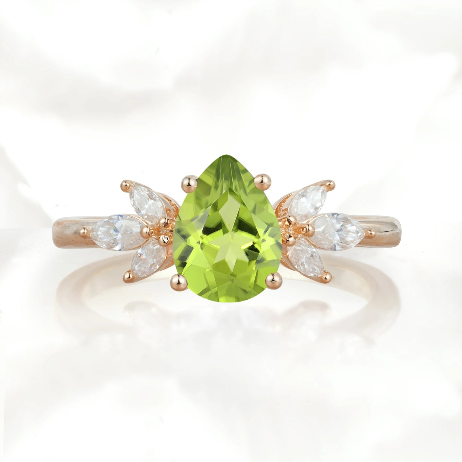 Elegant Pear-Shaped Peridot Engagement Ring with Floral Side Stones