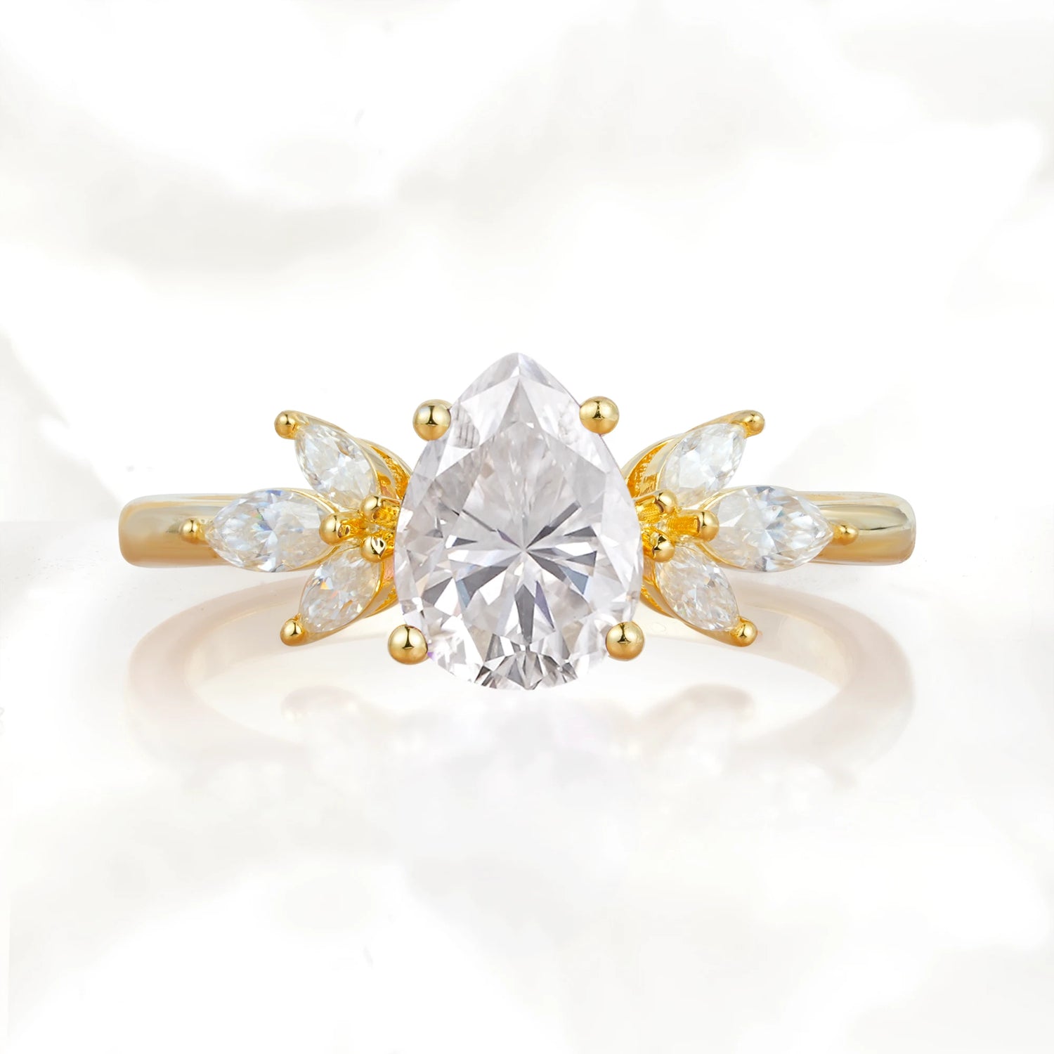 Elegant Pear-Shaped Moissanite Engagement Ring with Floral Side Stones