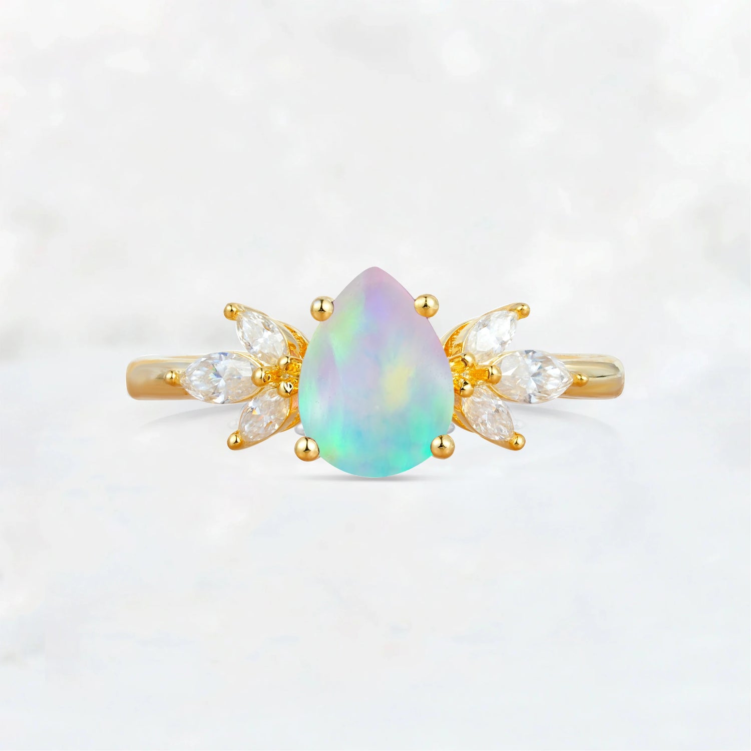Elegant Pear-Shaped Fire Opal Engagement Ring with Floral Side Stones