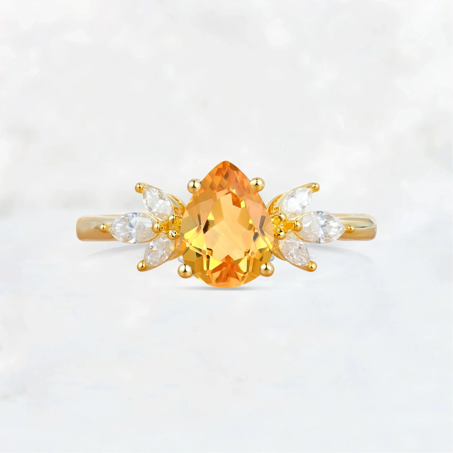 Elegant Pear-Shaped Citrine Engagement Ring with Floral Side Stones