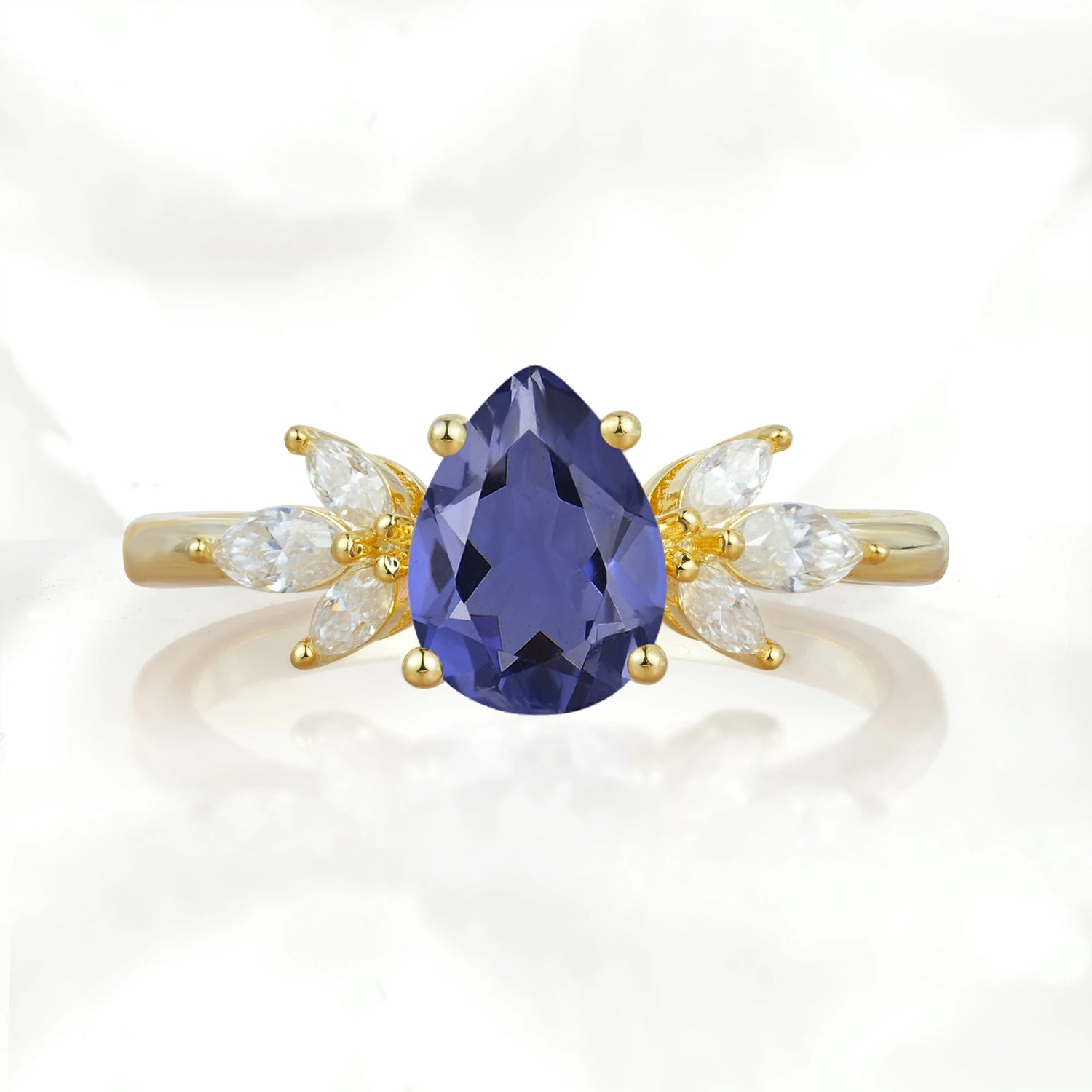 Elegant Pear-Shaped Tanzanite Engagement Ring with Floral Side Stones