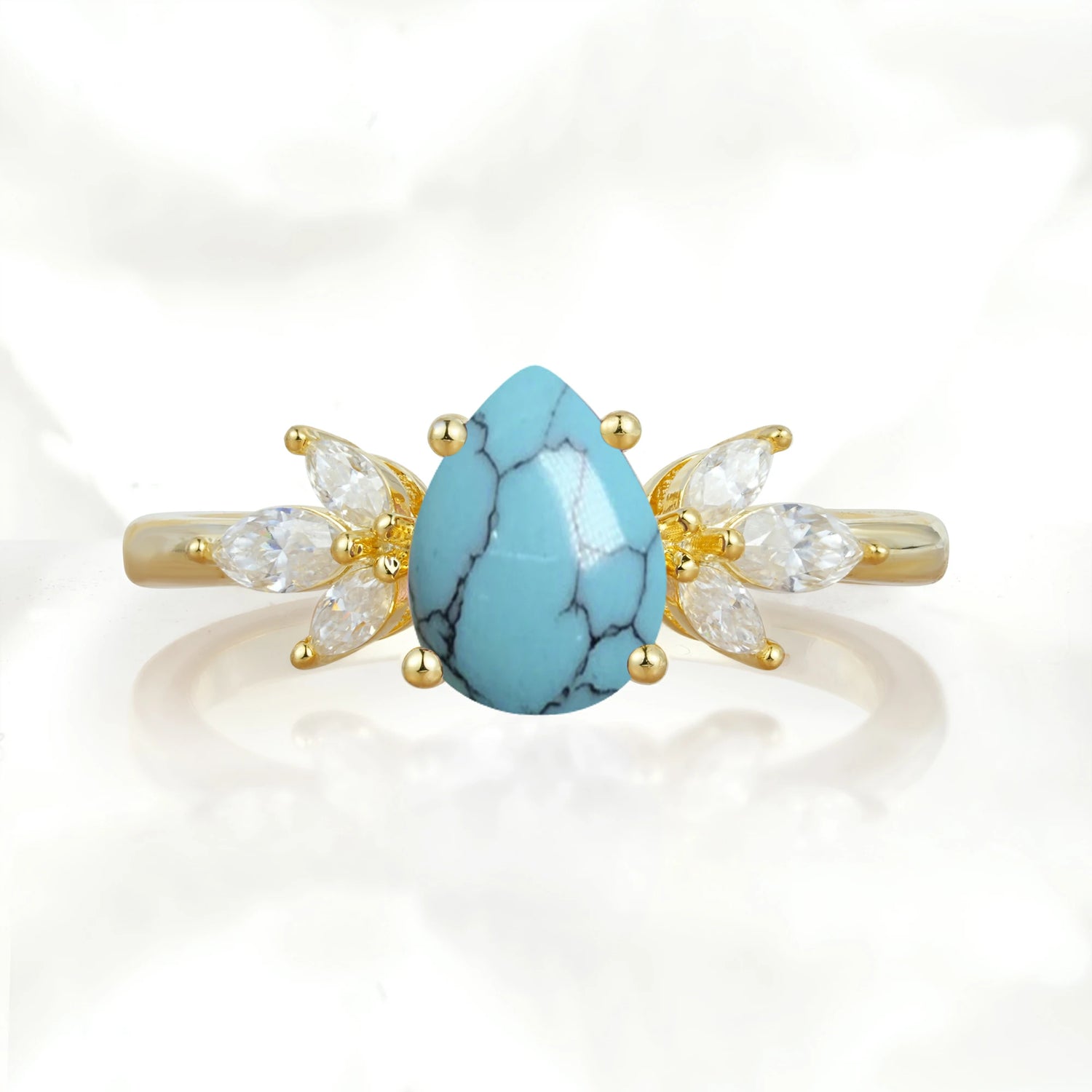 Elegant Pear-Shaped Turquoise Engagement Ring with Floral Side Stones