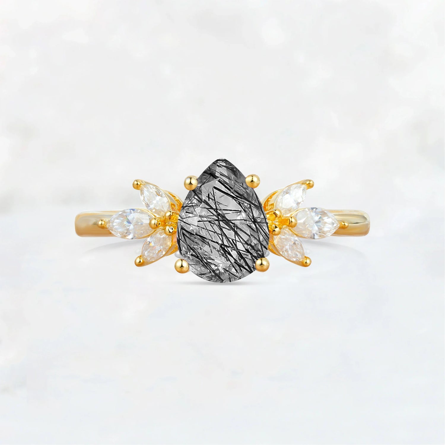 Elegant Pear-Shaped Black Rutilated Quartz Engagement Ring with Floral Side Stones