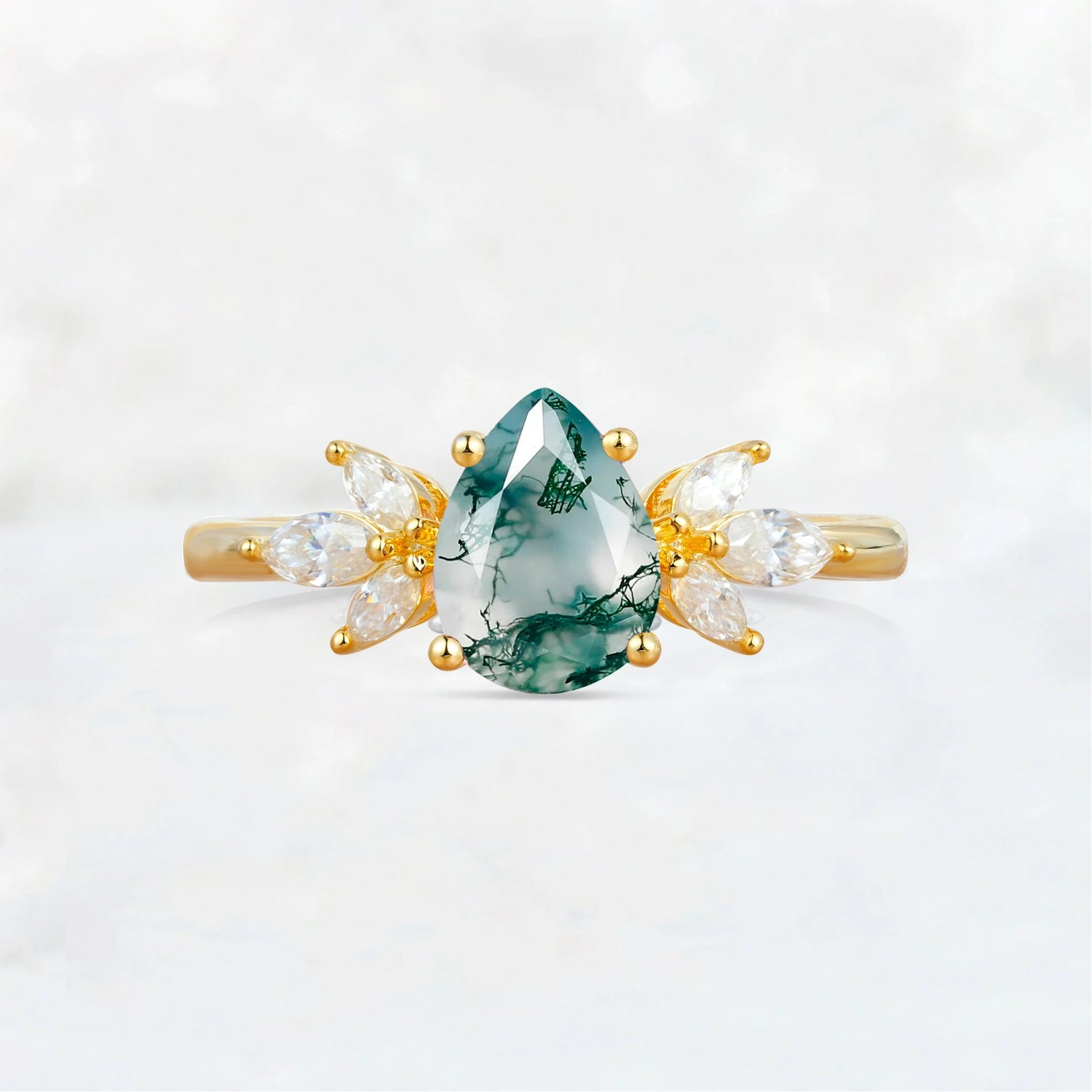 Elegant Pear-Shaped Moss Agate Engagement Ring with Floral Side Stones