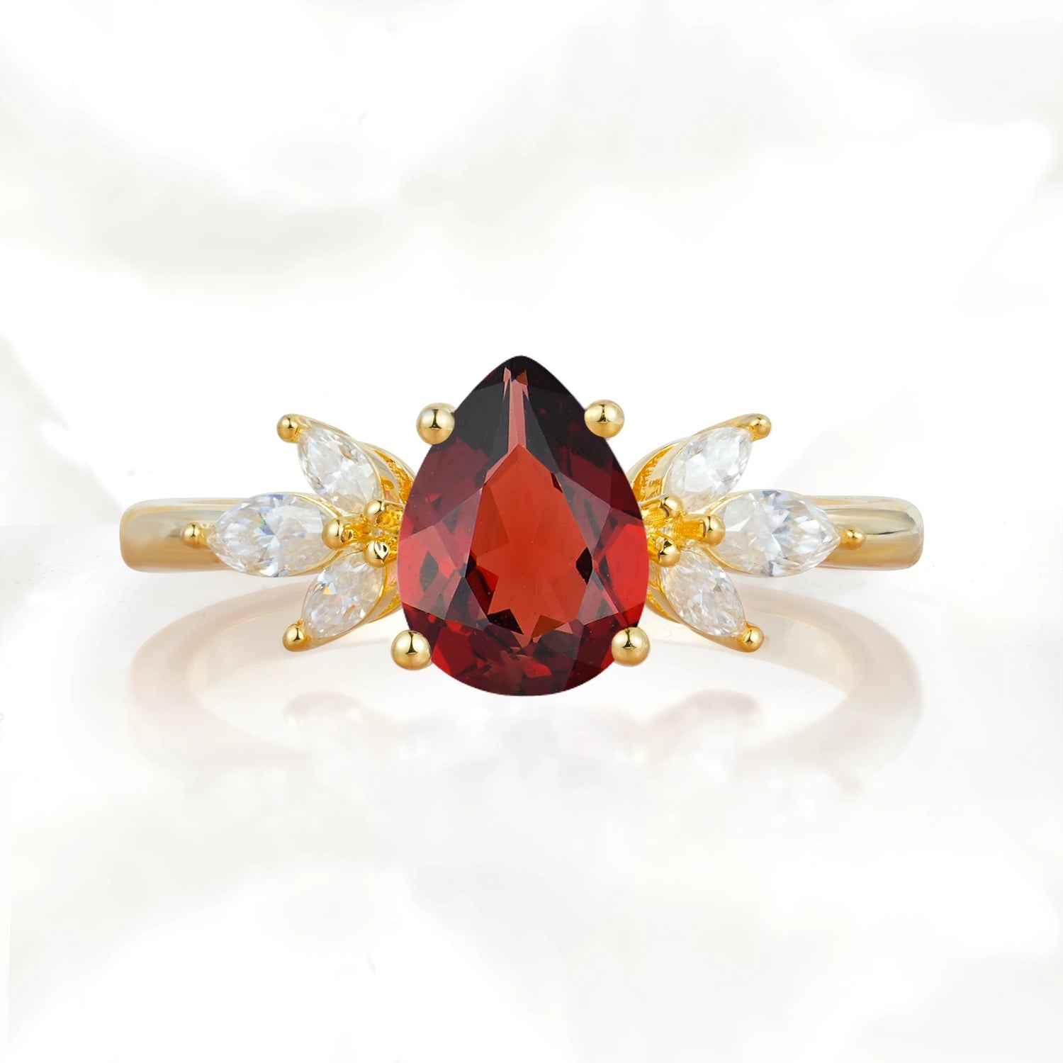 Elegant Pear-Shaped Garnet Engagement Ring with Floral Side Stones