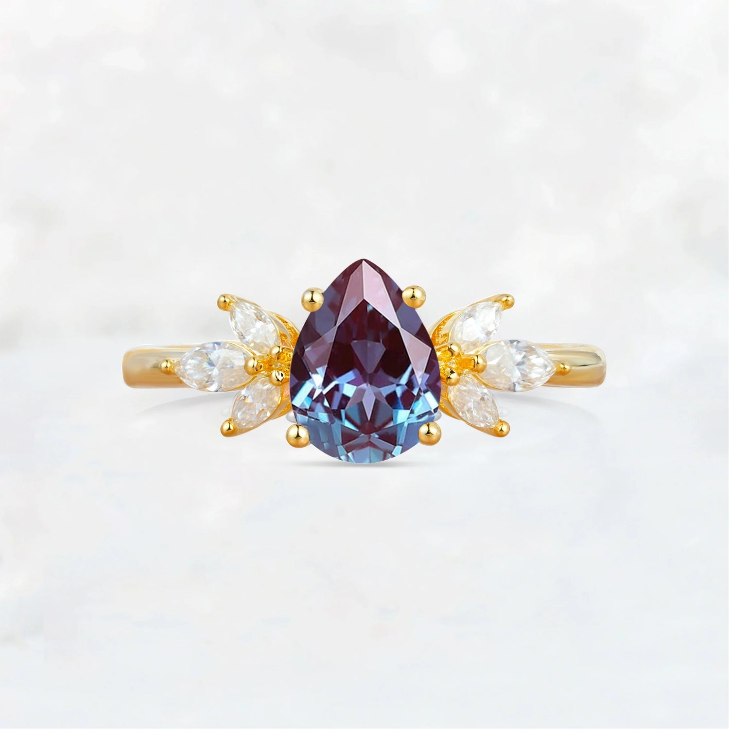 Elegant Pear-Shaped Alexandrite Engagement Ring with Floral Side Stones