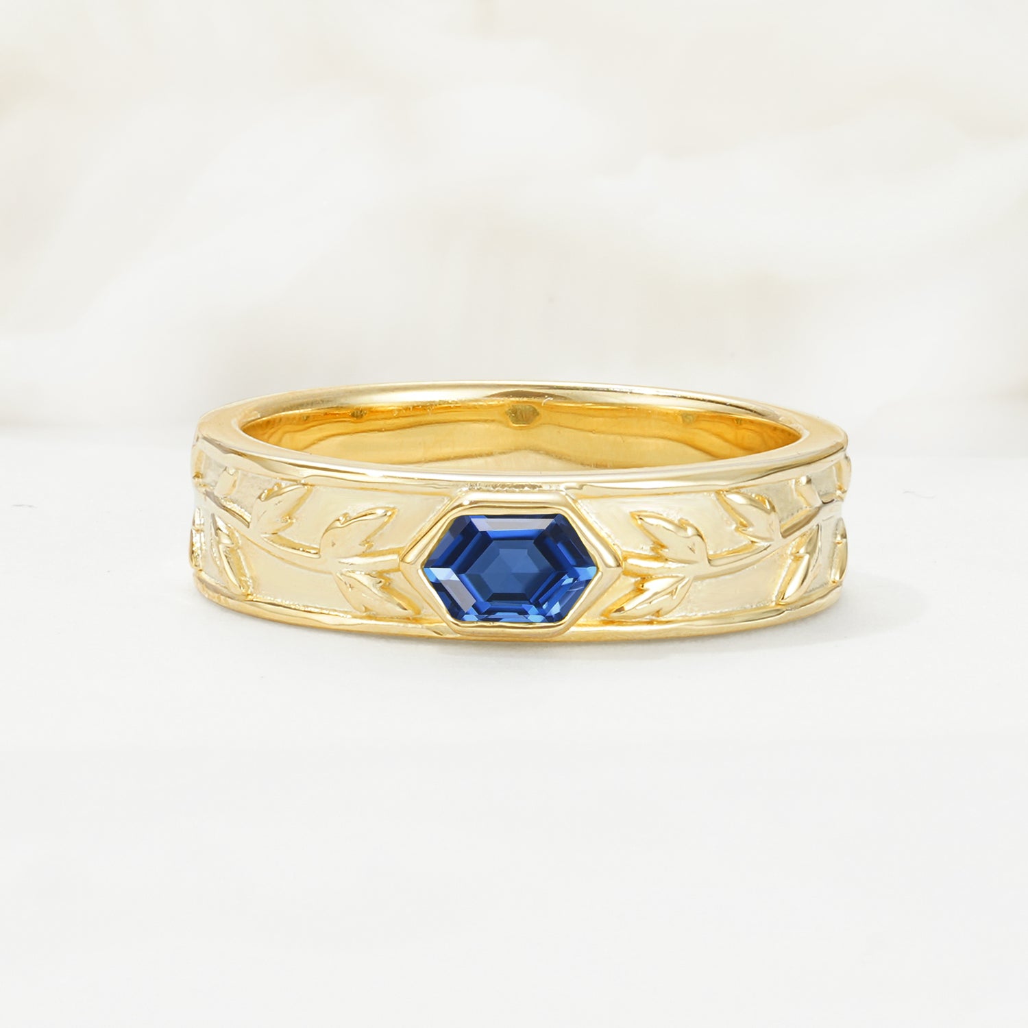 Elegant Hexagonal Cut Leaf Engraved Sapphire Wedding Band