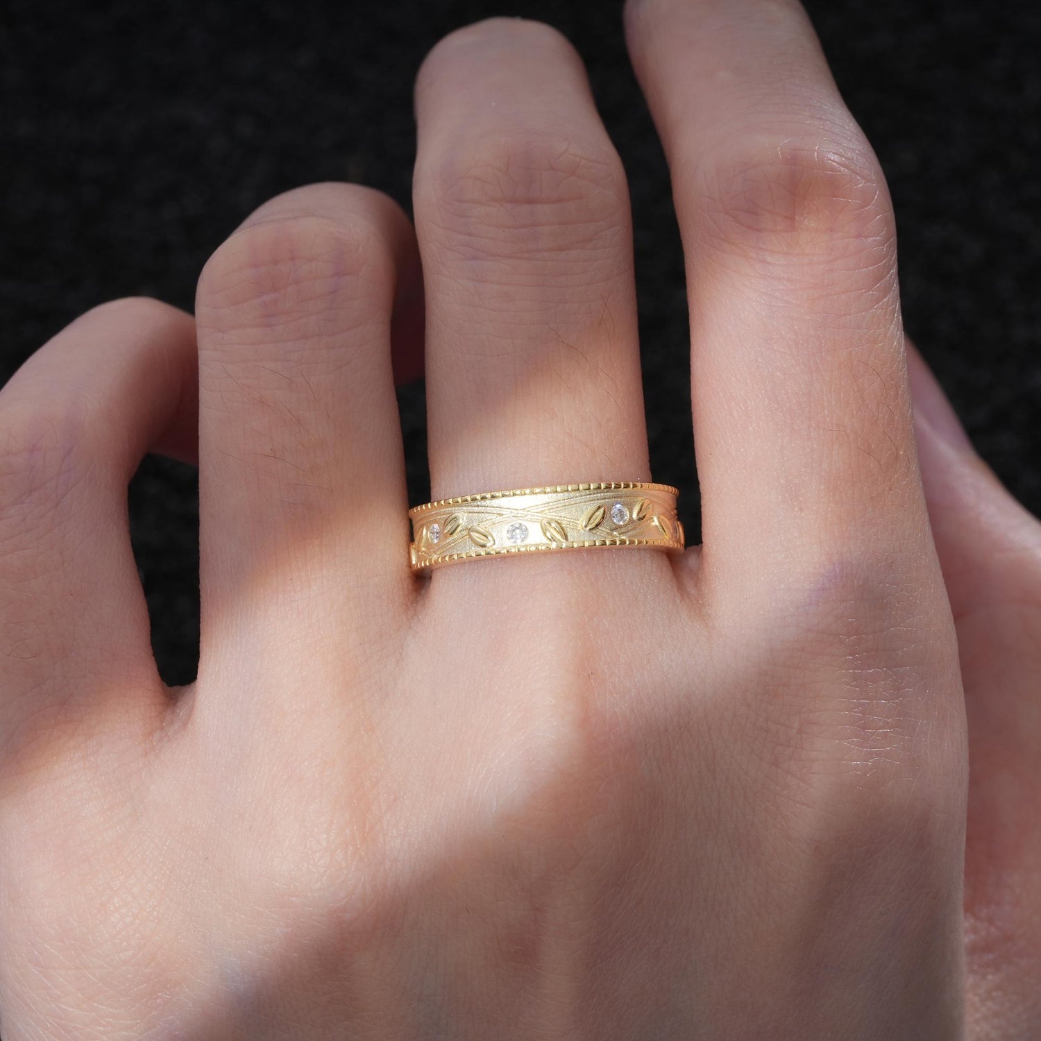 Nature-Inspired Engraved Leaf Vine Wedding Band with Round Cut Moissanite Accents - Additional view
