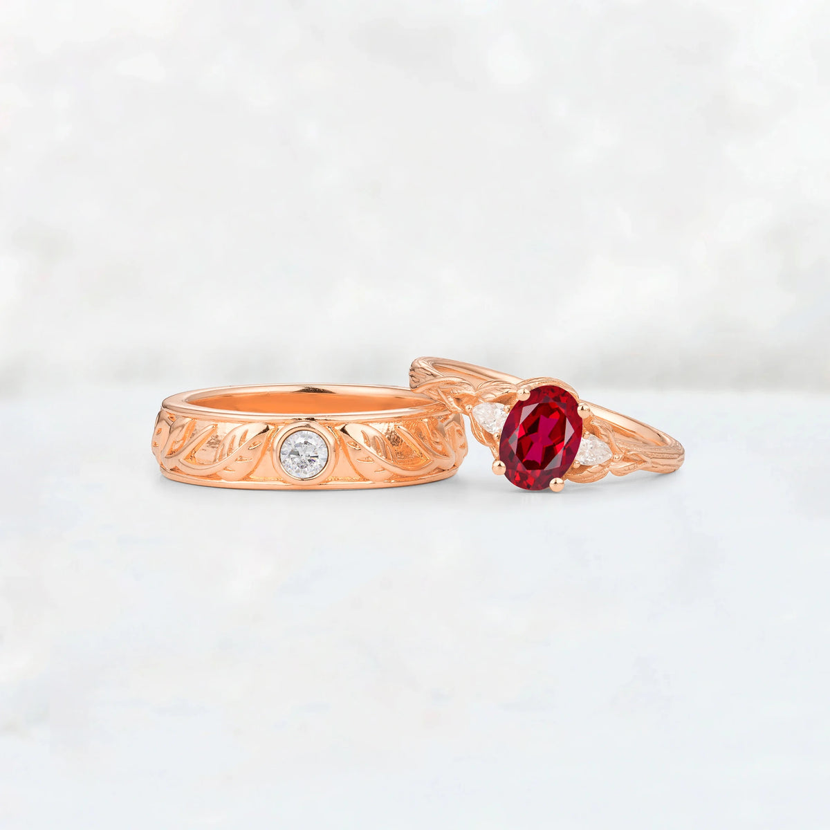 Oval Ruby Leaf & Vine His and Hers Wedding Ring Set