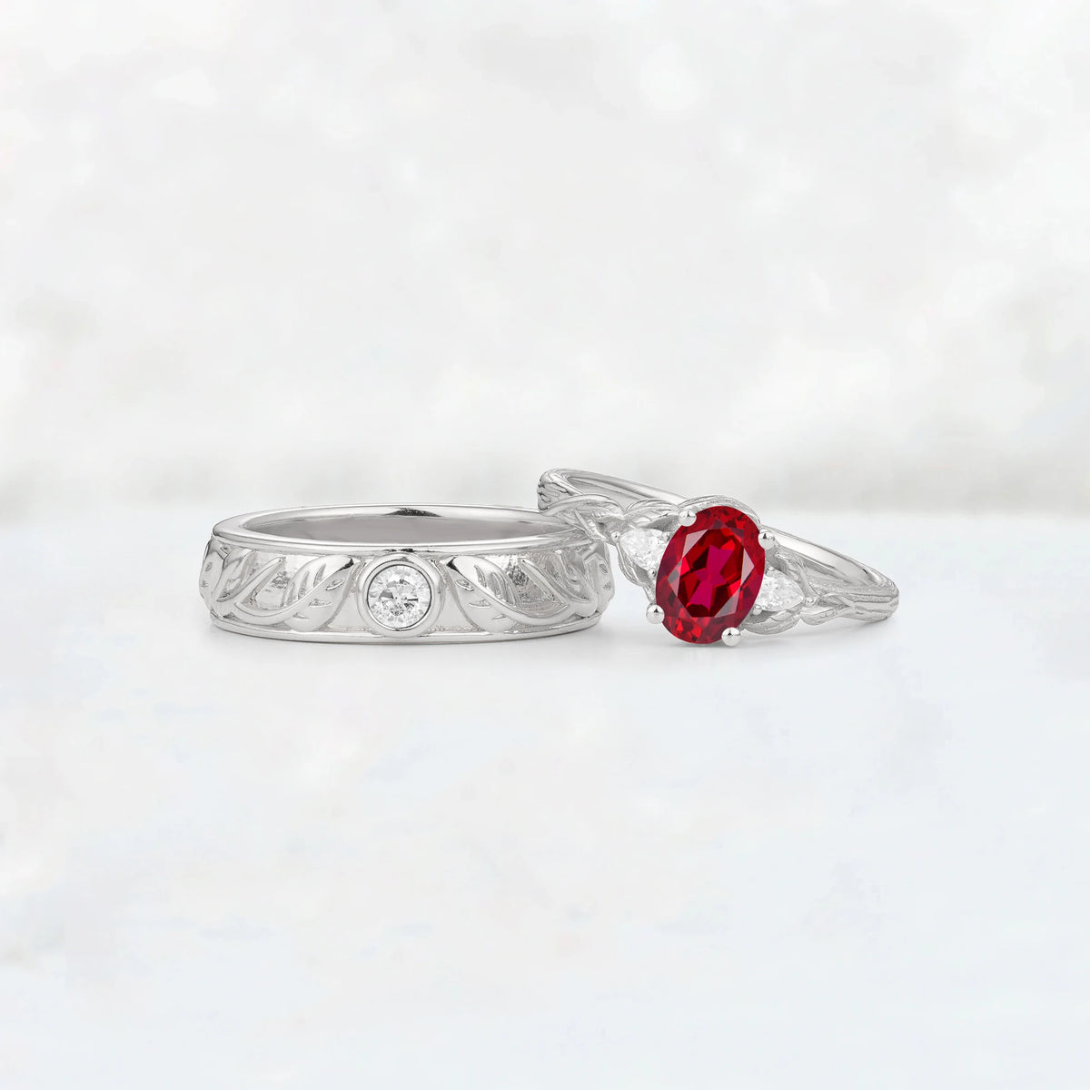 Oval Ruby Leaf & Vine His and Hers Wedding Ring Set
