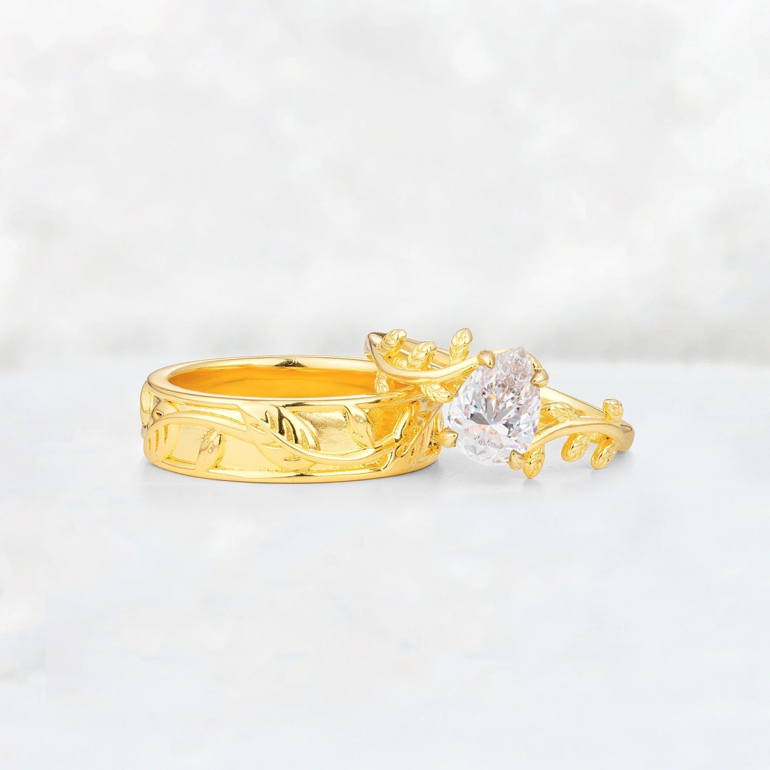 Pear Cut Moissanite Branch & Leaf His and Hers Wedding Ring Set
