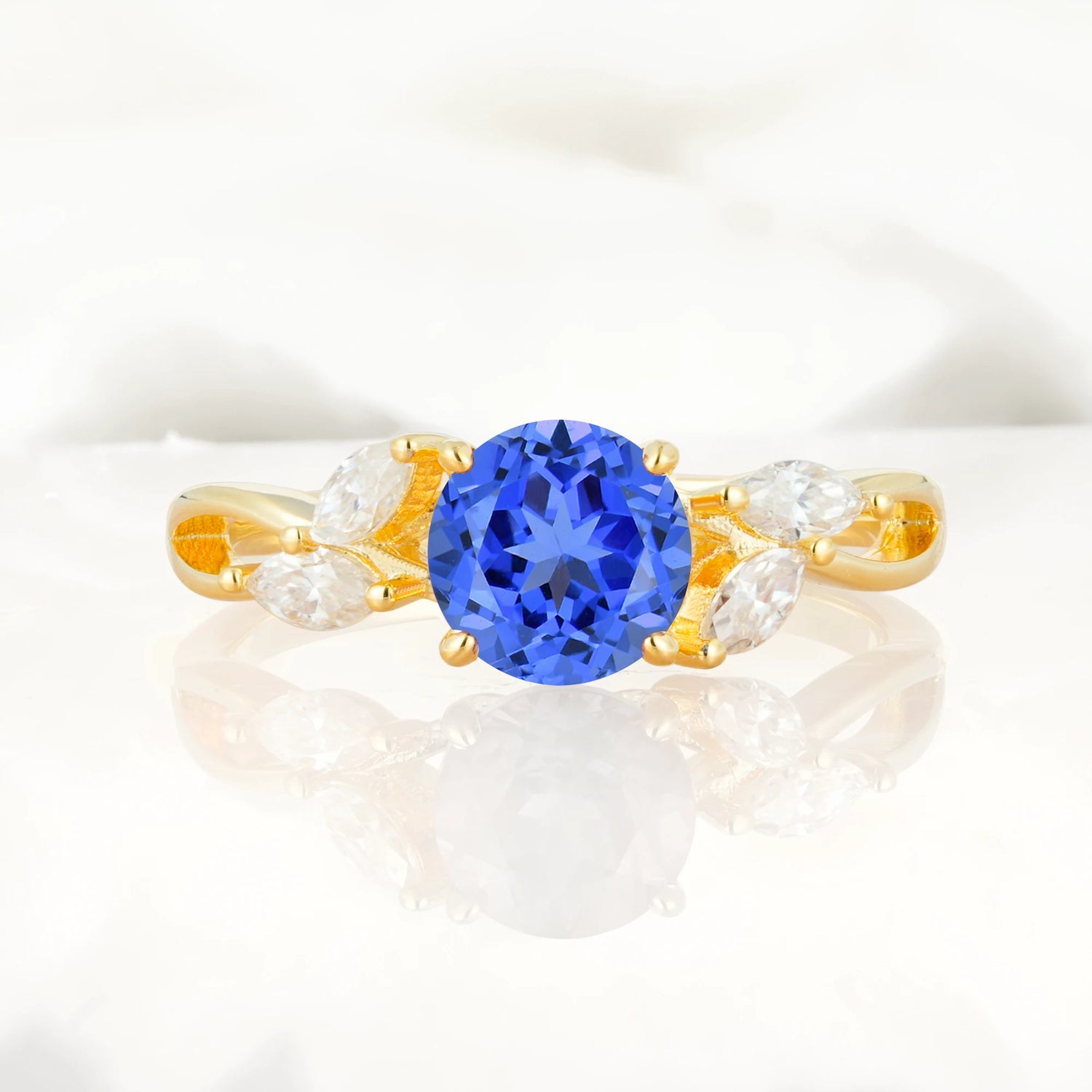 Twisted Band Round Cut Sapphire Engagement Ring with Marquise Accent