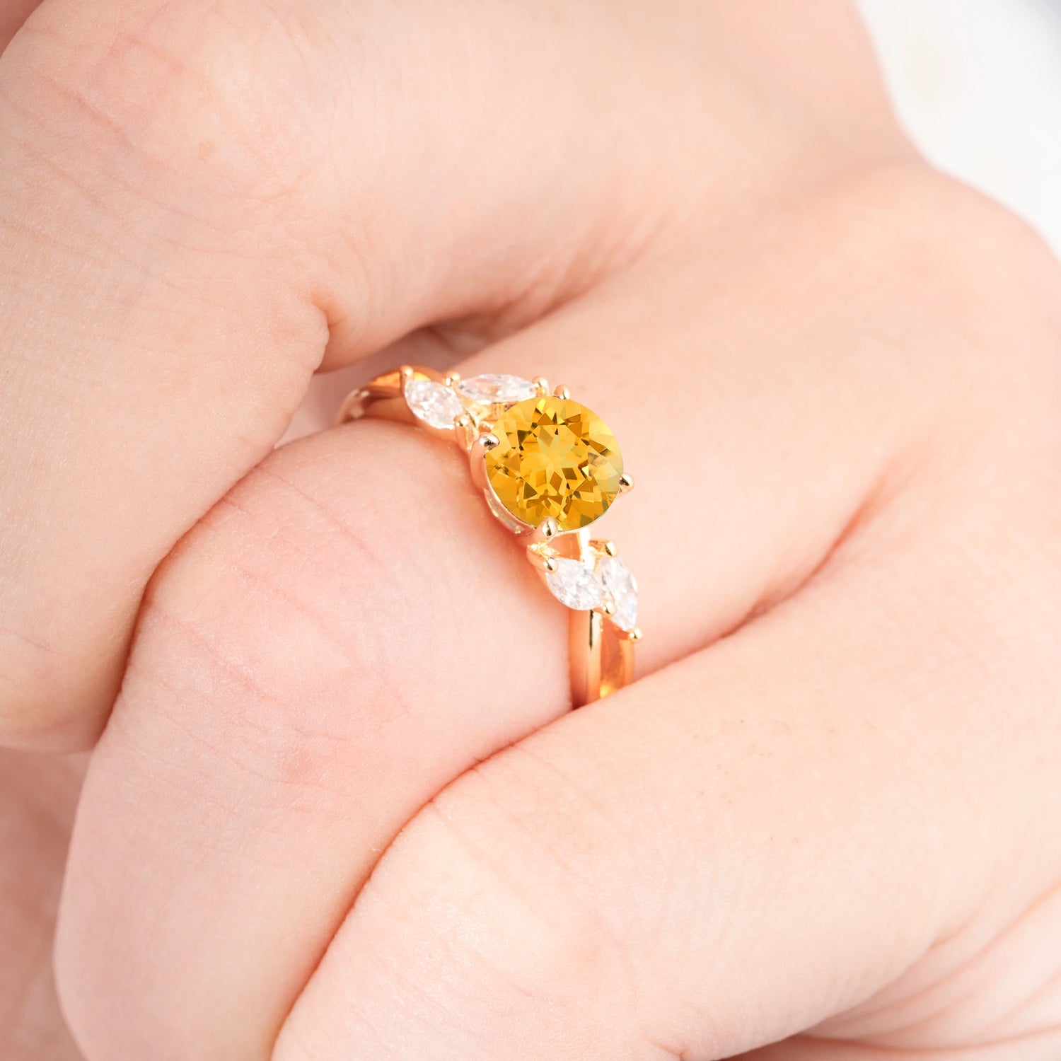 Twisted Band Round Cut Citrine Engagement Ring with Marquise Accent