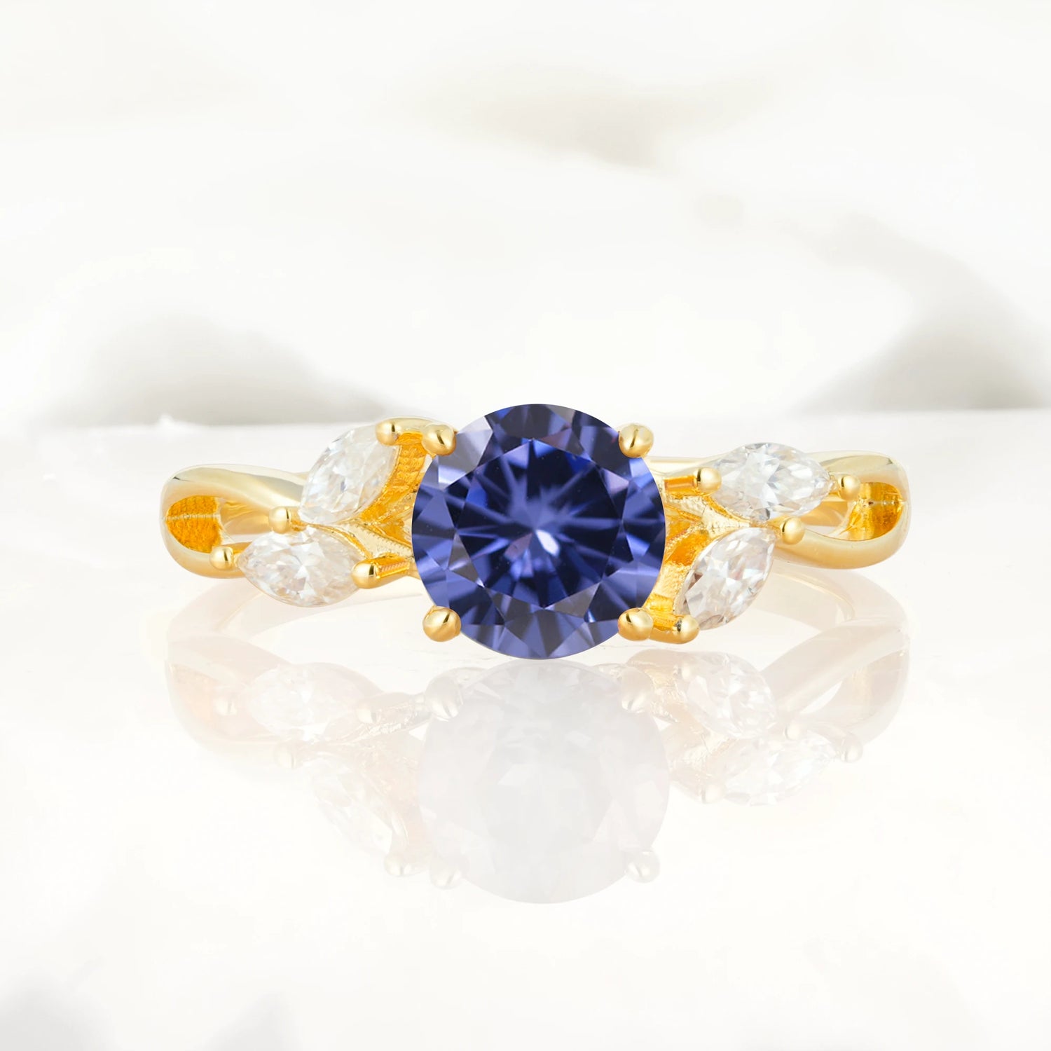 Twisted Band Round Cut Tanzanite Engagement Ring with Marquise Accent