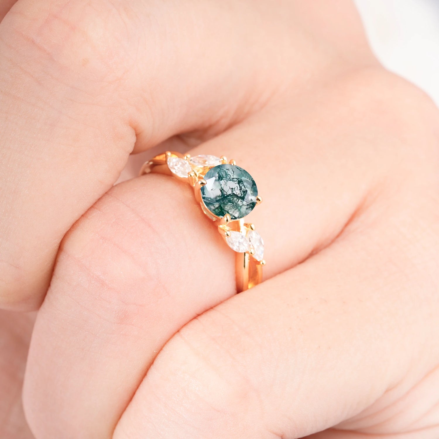 Twisted Band Round Cut Moss Agate Engagement Ring with Marquise Accent