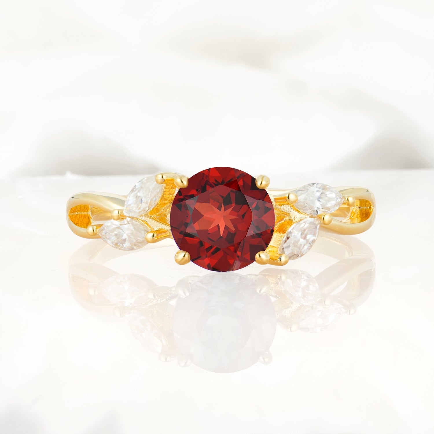 Twisted Band Round Cut Garnet Engagement Ring with Marquise Accent