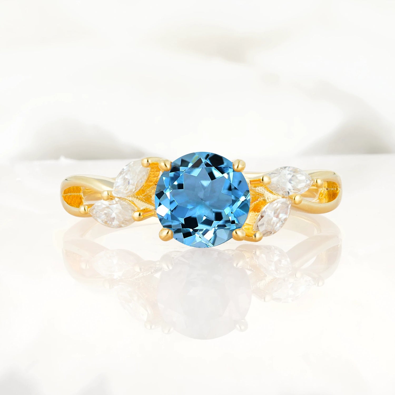 Twisted Band Round Cut Aquamarine Engagement Ring with Marquise Accent