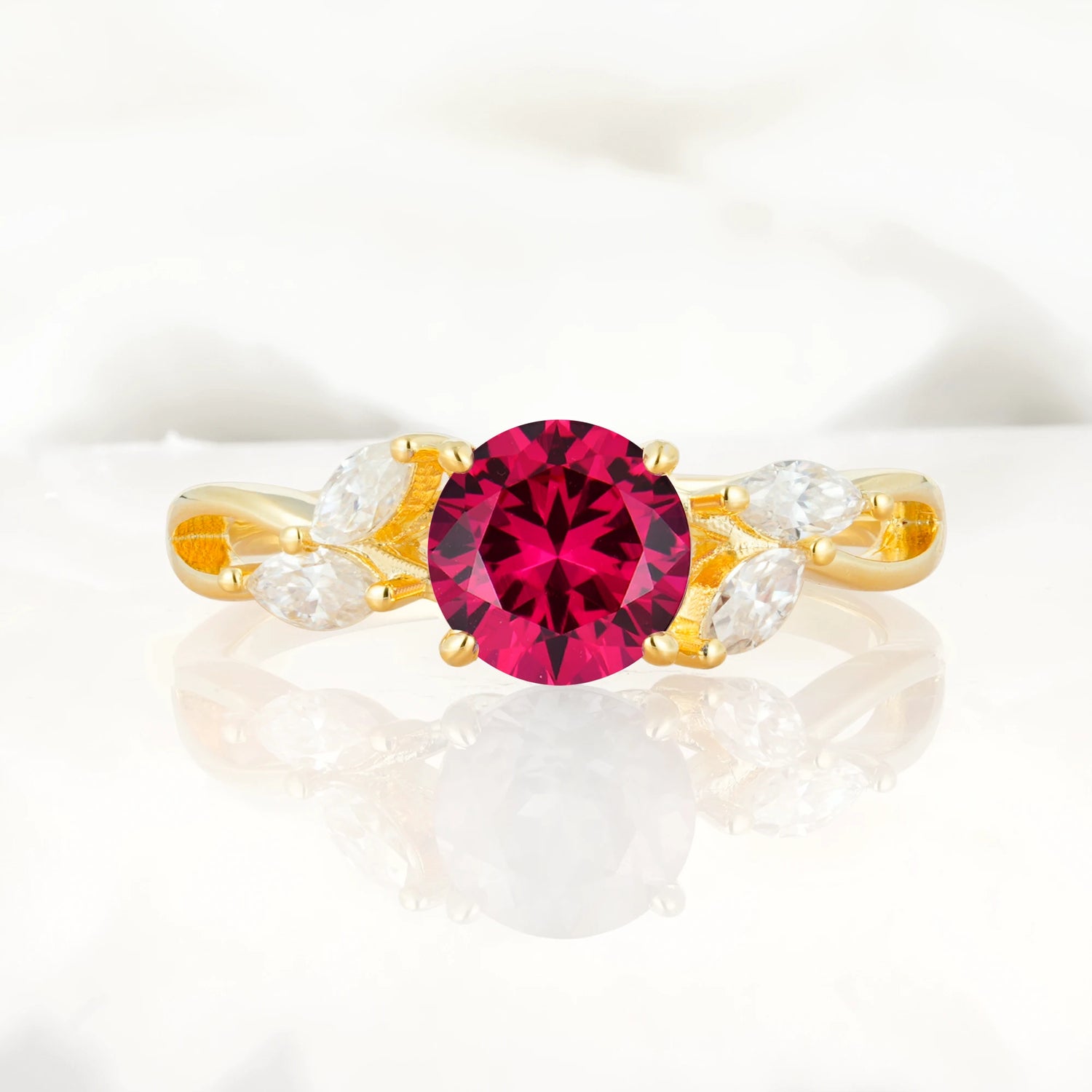 Twisted Band Round Cut Ruby Engagement Ring with Marquise Accent