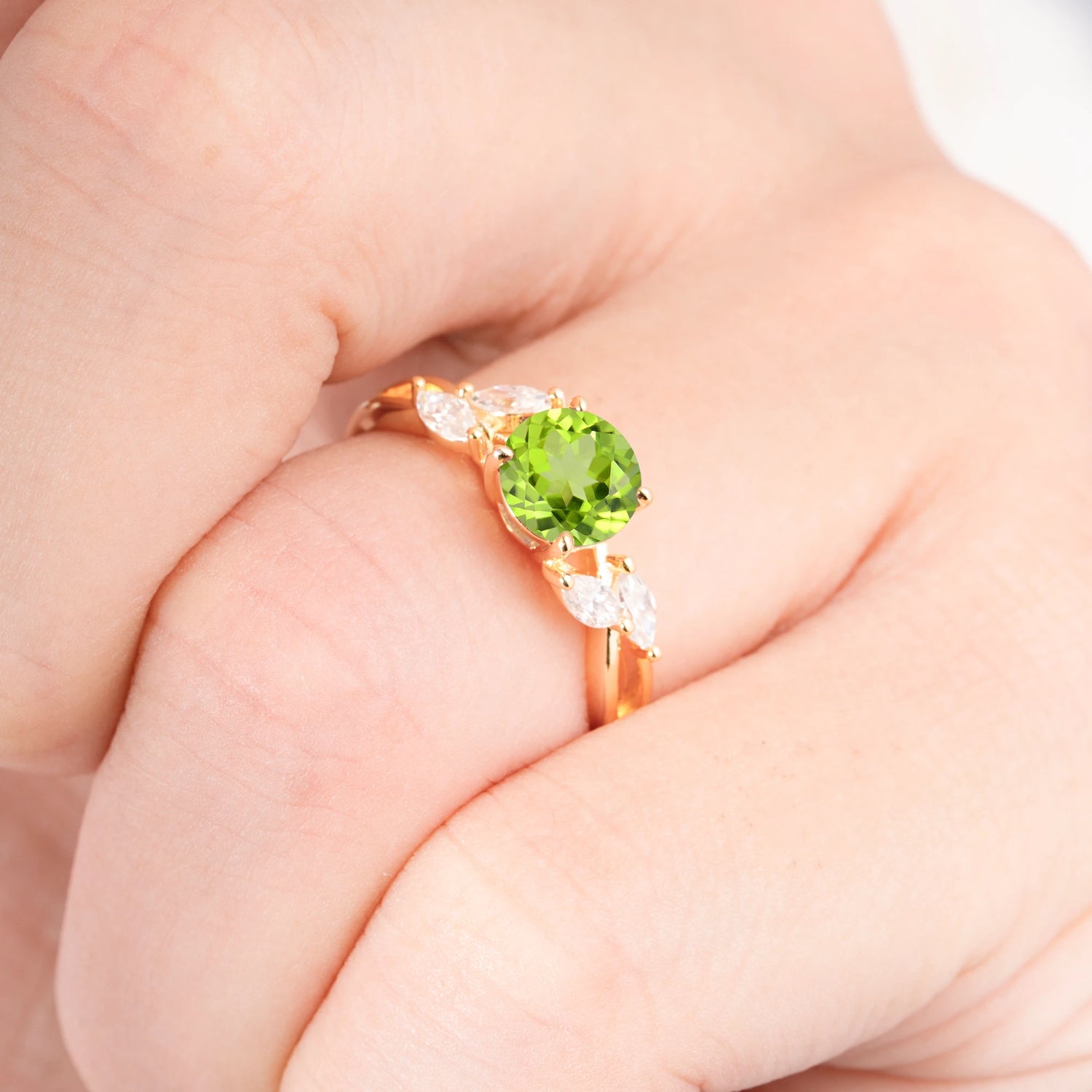 Twisted Band Round Cut Peridot Engagement Ring with Marquise Accent