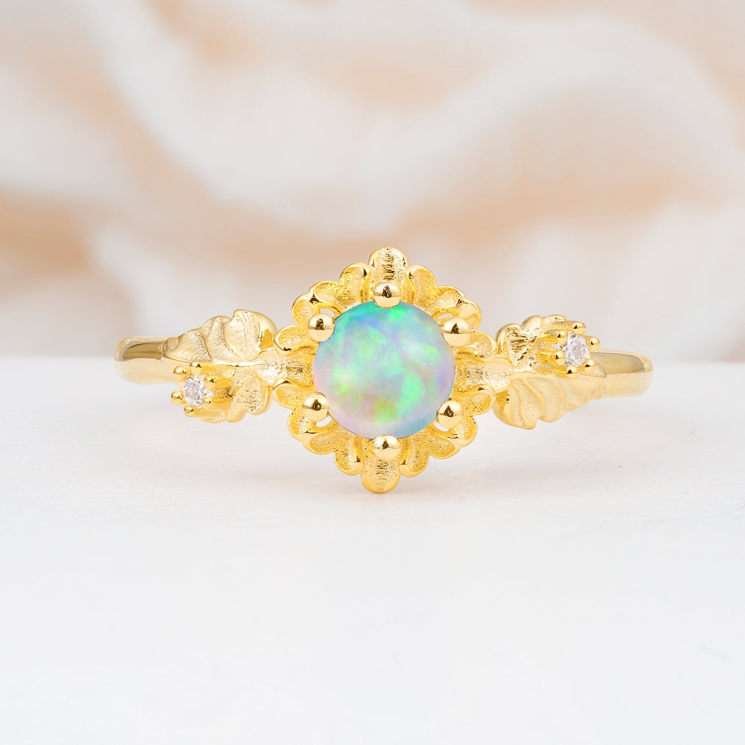 Naturally inspired round-cut Opal sparkling engagement ring