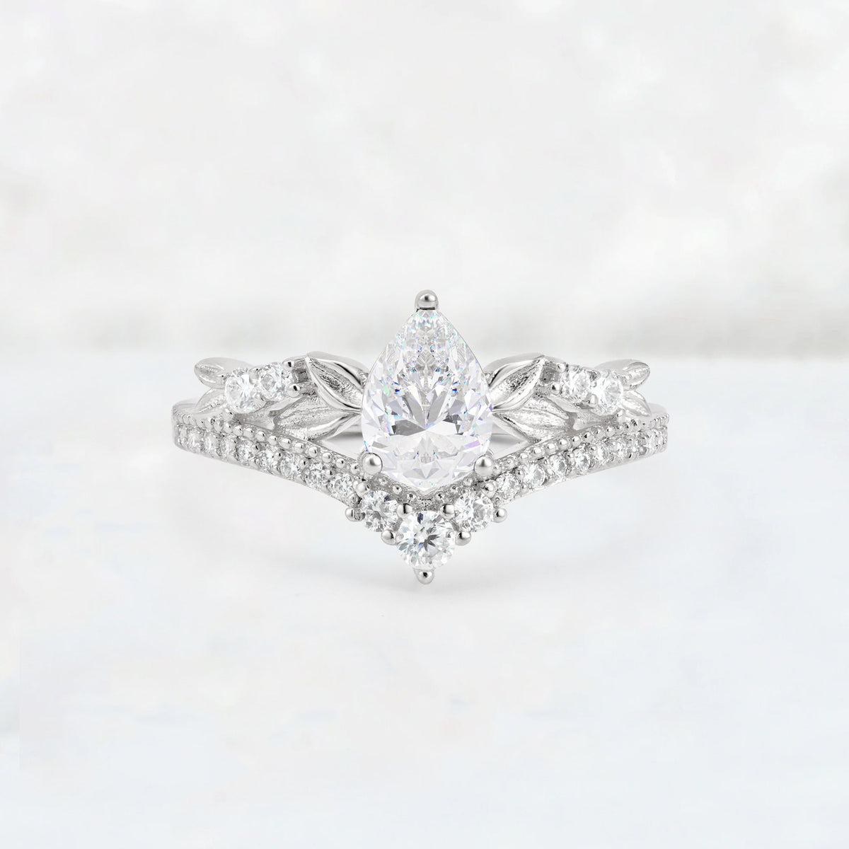 Pear Cut Moissanite Leaf Chevron Bridal Ring Set - Additional view