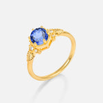 Round Cut Sapphire Engagement Ring with Floral Side Stone Detail - Additional view