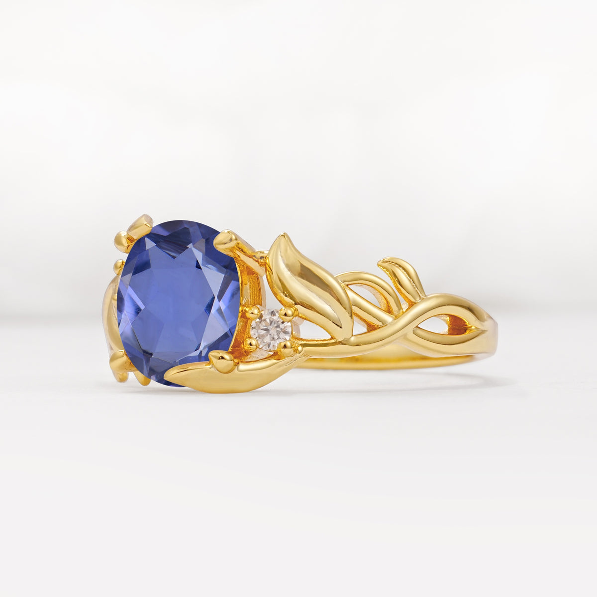 Natural Inspired Oval Cut Leaf Vine Side Stone Tanzanite Engagement Ring - Additional view