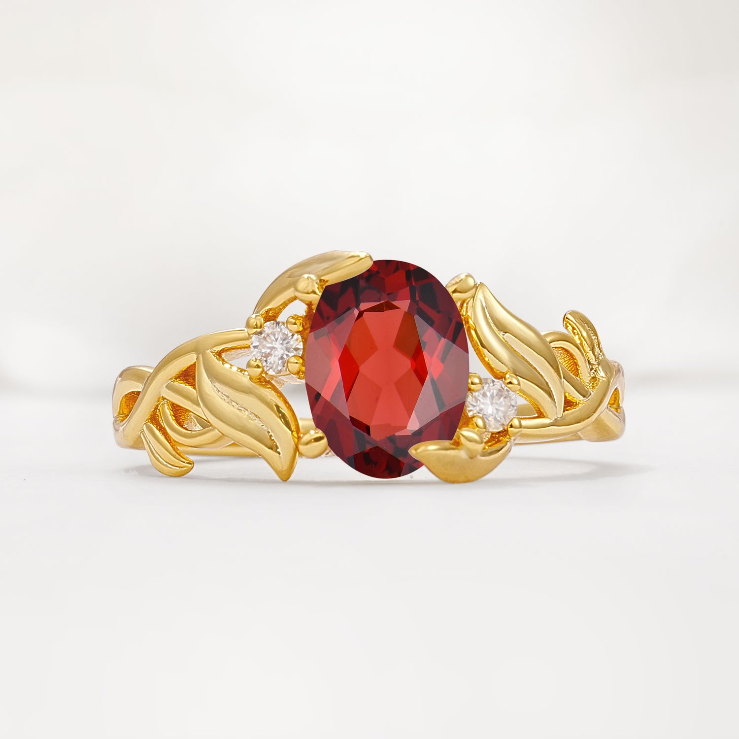 Natural Inspired Oval Cut Leaf Vine Side Stone Garnet Engagement Ring