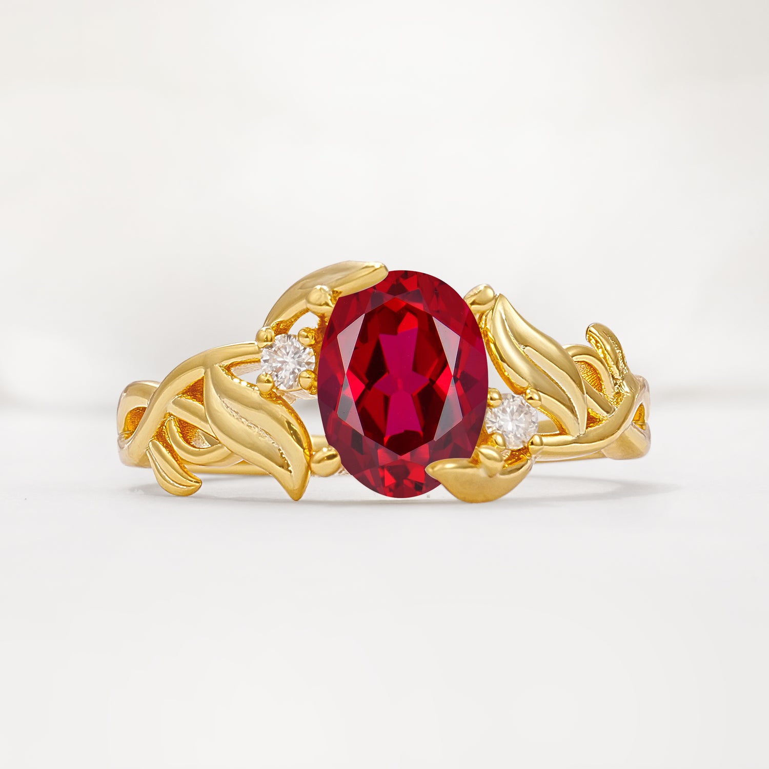 Natural Inspired Oval Cut Leaf Vine Side Stone Ruby Engagement Ring