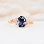 Romantic Oval Cut Twisted Scroll Side Stone Alexandrite Engagement Ring - Additional view