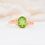 Romantic Oval Cut Twisted Scroll Side Stone Peridot Engagement Ring - Additional view
