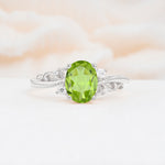 Romantic Oval Cut Twisted Scroll Side Stone Peridot Engagement Ring - Additional view