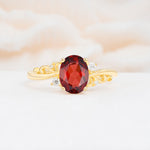 Romantic Oval Cut Twisted Scroll Side Stone Garnet Engagement Ring - Additional view