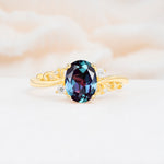 Romantic Oval Cut Twisted Scroll Side Stone Alexandrite Engagement Ring - Additional view