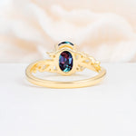 Romantic Oval Cut Twisted Scroll Side Stone Alexandrite Engagement Ring - Additional view