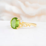 Romantic Oval Cut Twisted Scroll Side Stone Peridot Engagement Ring - Additional view