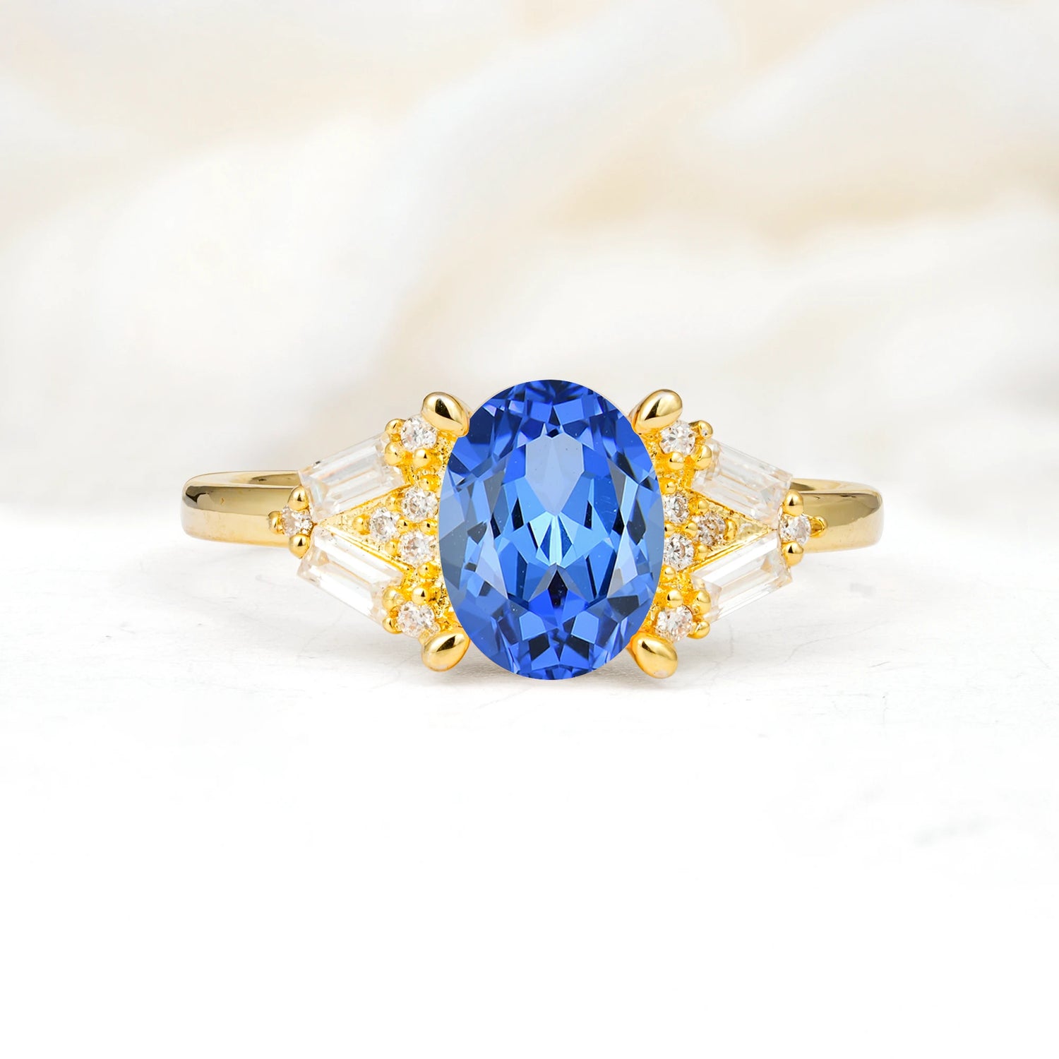 Classic Oval Cut Baguette Side Cluster Sapphire Engagement Ring