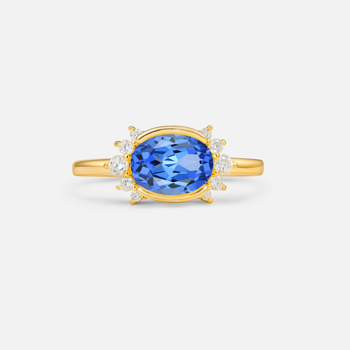 Timeless Oval Cut Bezel Frame Halo Sapphire Engagement Ring