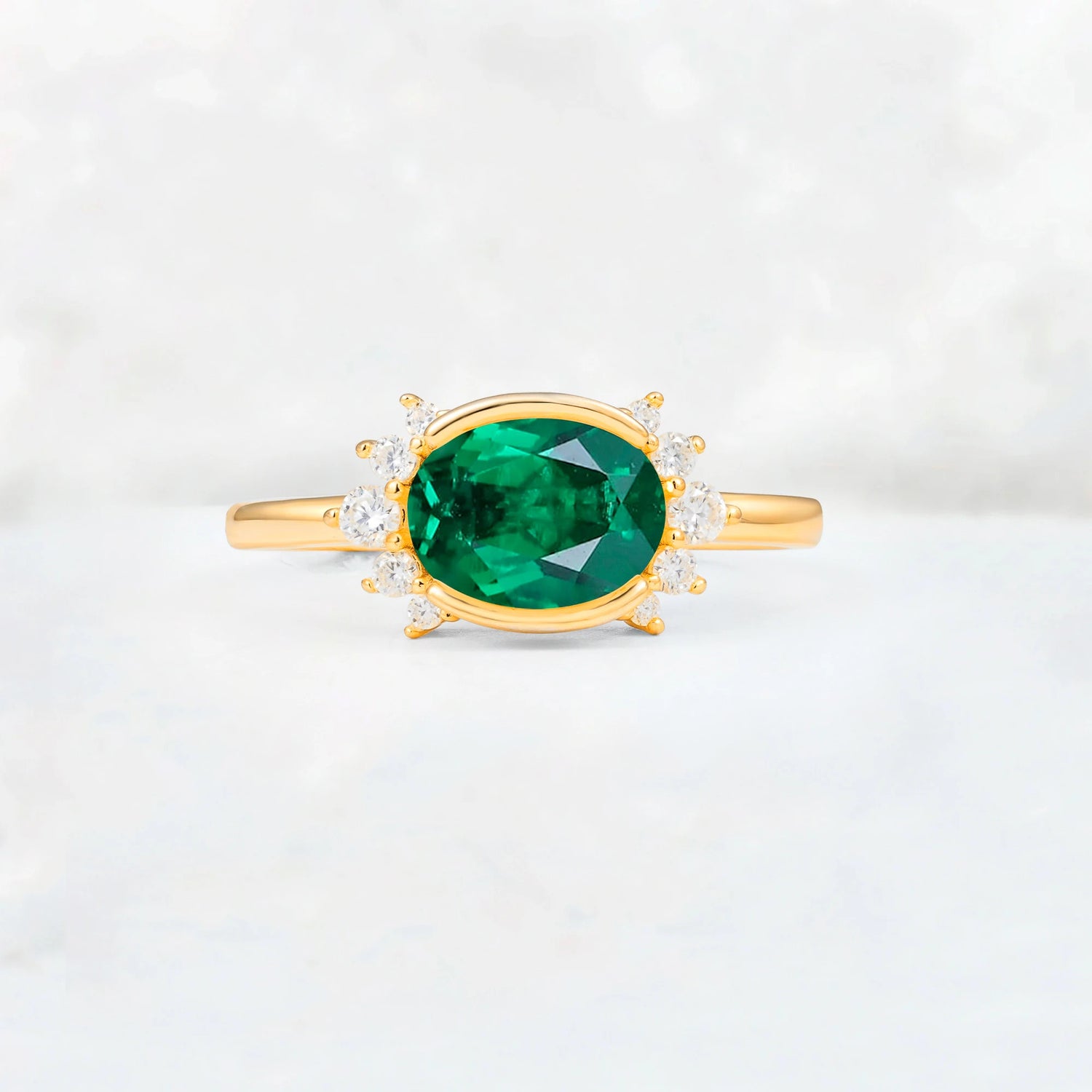 Timeless Oval Cut Bezel Frame Halo Emerald Engagement Ring