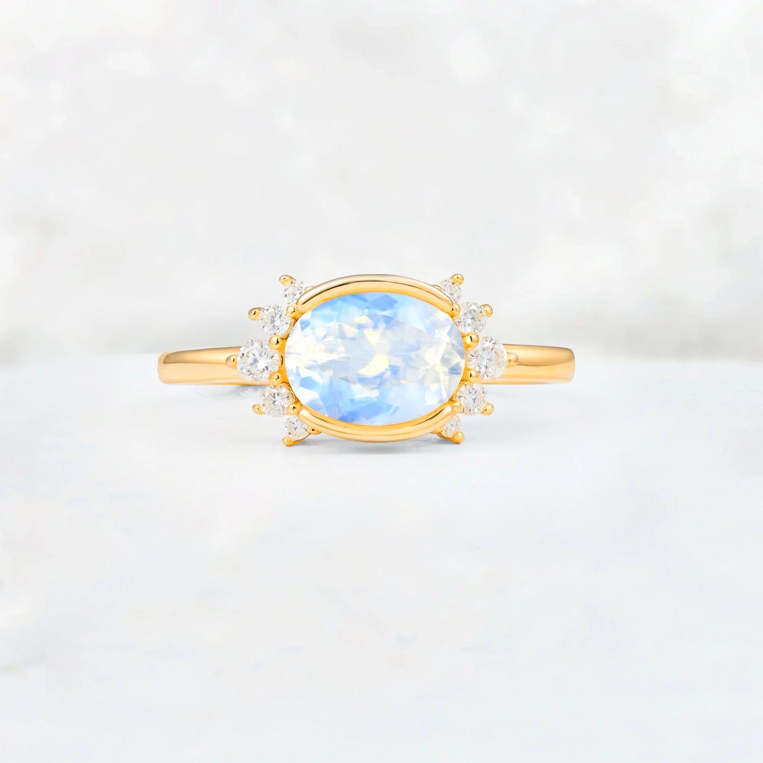 Timeless Oval Cut Bezel Frame Halo Moonstone Engagement Ring