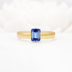 Emerald Cut Sapphire Tapered Pavé Solitaire Engagement Ring - Additional view
