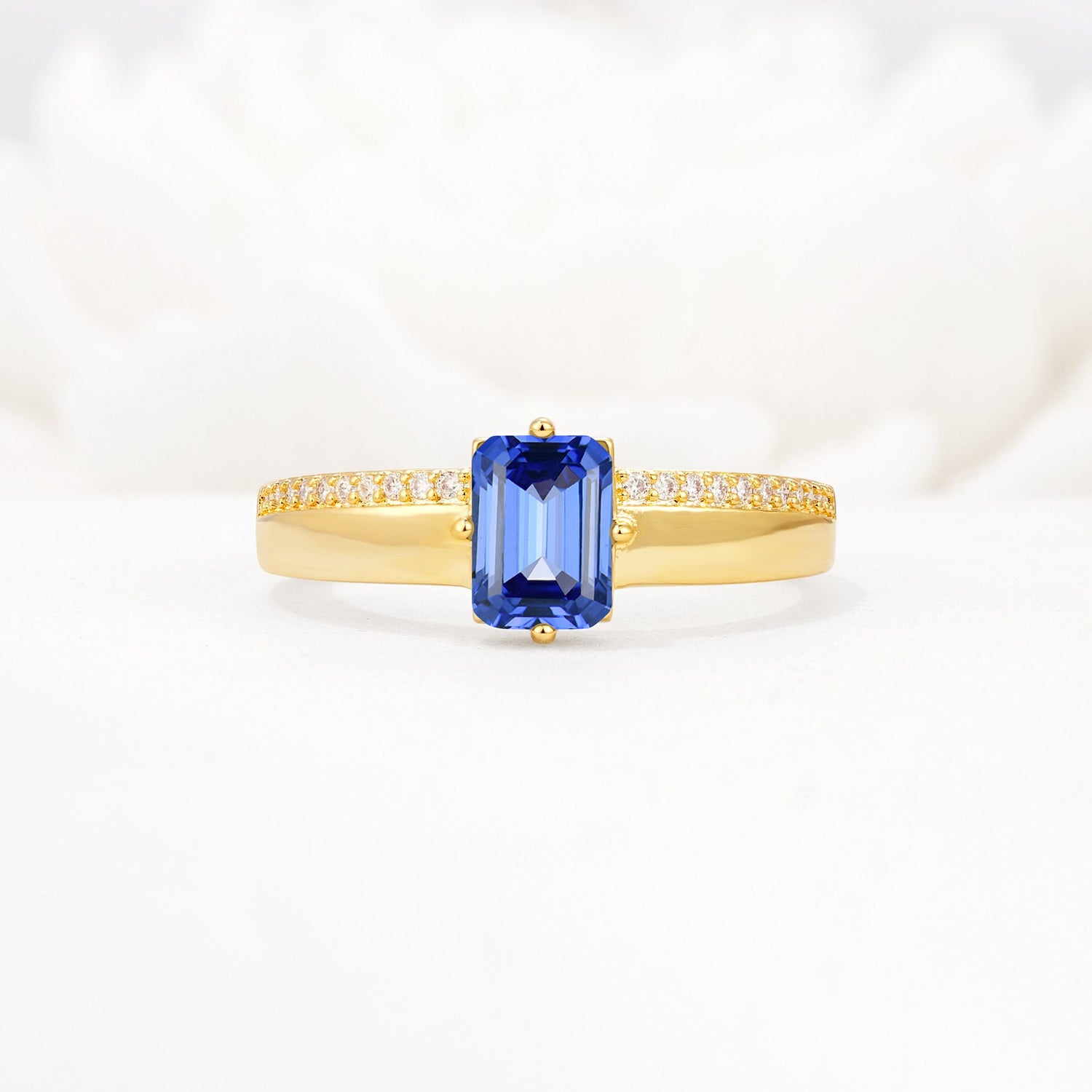 Emerald Cut Sapphire Tapered Pavé Solitaire Engagement Ring - Additional view