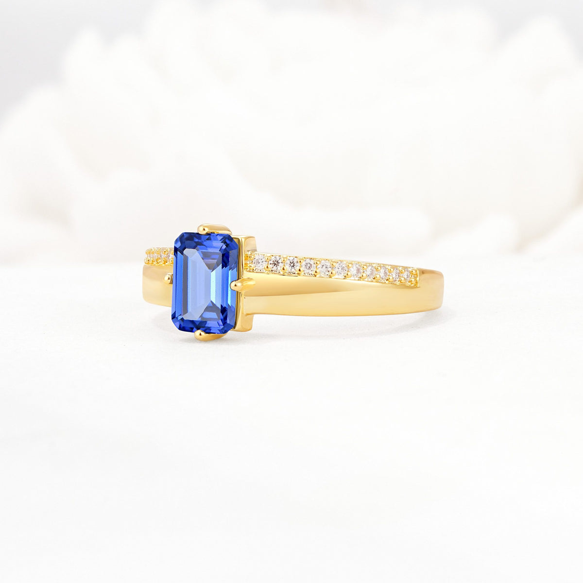 Emerald Cut Sapphire Tapered Pavé Solitaire Engagement Ring - Additional view